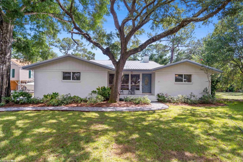 Charming remodeled (2021) and well maintained brick waterfront - Beach Home for sale in Gulf Shores, Alabama on Beachhouse.com