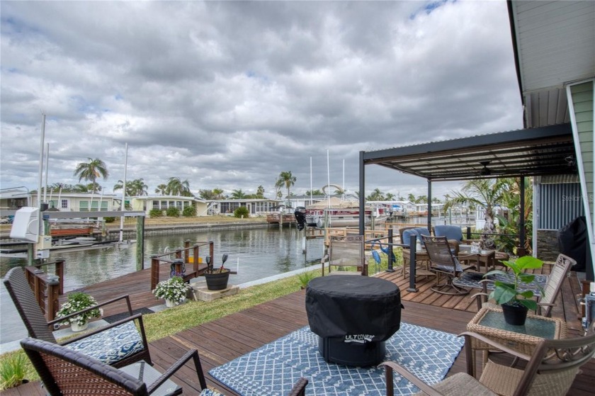 Exceptional waterfront home with dock and boat lift! Come and - Beach Home for sale in Clearwater, Florida on Beachhouse.com