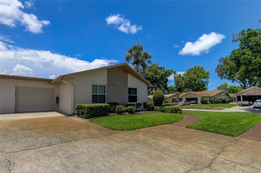 Discover the Florida lifestyle in this resort-style, corner lot - Beach Home for sale in Palm Harbor, Florida on Beachhouse.com