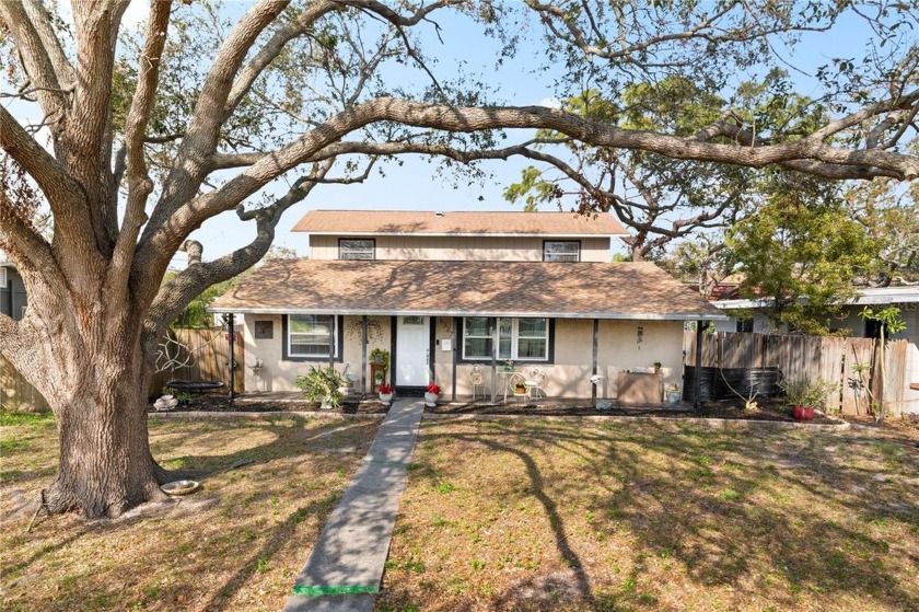 This charming 4 bedroom, 3 bath home has the perfect mix of - Beach Home for sale in St. Petersburg, Florida on Beachhouse.com