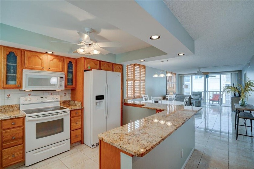 Experience the charm of this light-filled, corner end unit - Beach Condo for sale in Boynton Beach, Florida on Beachhouse.com