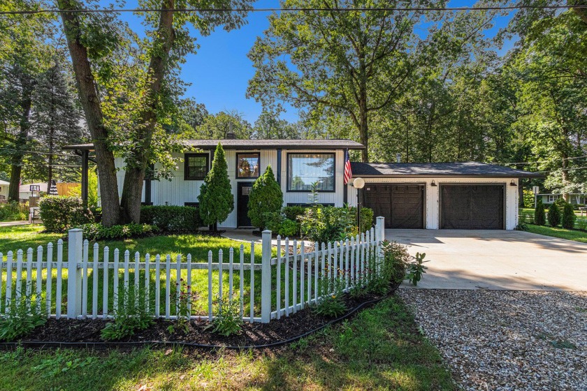 Gracefully positioned on a corner lot in New Buffalo, MI, this - Beach Home for sale in New Buffalo, Michigan on Beachhouse.com