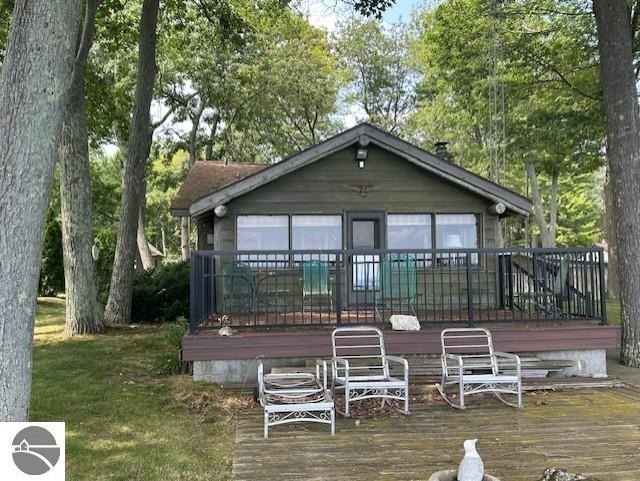 This is the adorable log cottage *Up North* that you have been - Beach Home for sale in East Tawas, Michigan on Beachhouse.com