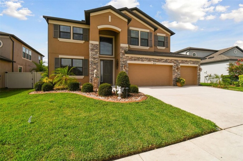 Feel safe and sound in this stunning home with a custom pool! - Beach Home for sale in Spring Hill, Florida on Beachhouse.com