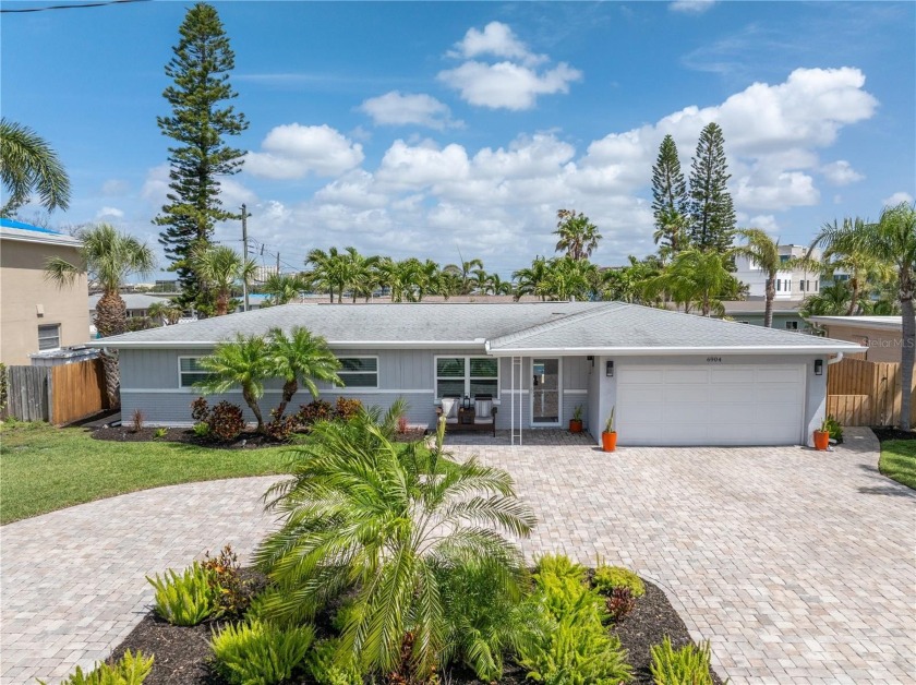 Welcome to 6904 Grande Vista Way S, a beautifully remodeled gem - Beach Home for sale in St. Petersburg, Florida on Beachhouse.com