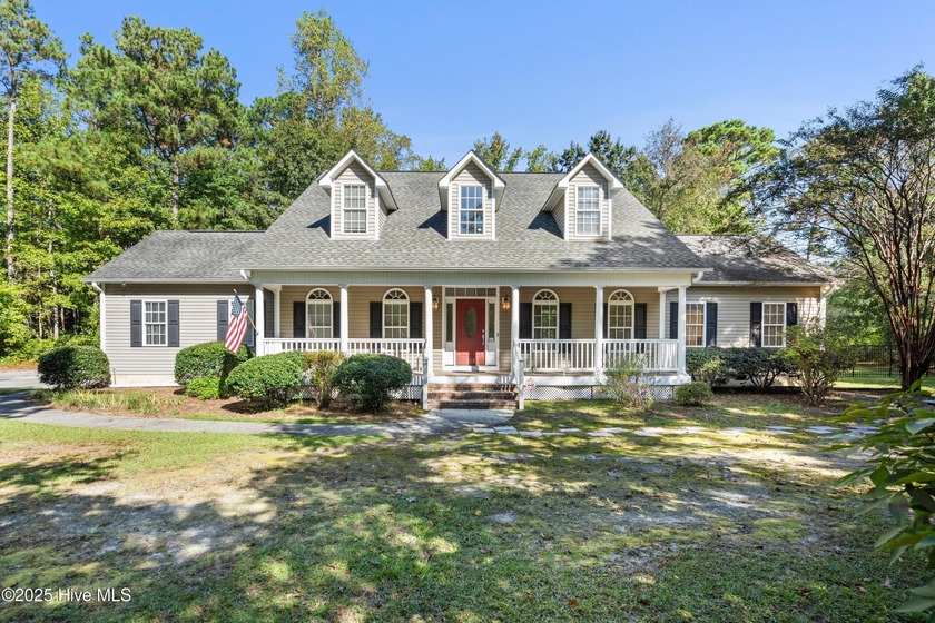 You don't want to miss this 5 bedroom, 3.5 bathroom Coastal - Beach Home for sale in Hampstead, North Carolina on Beachhouse.com