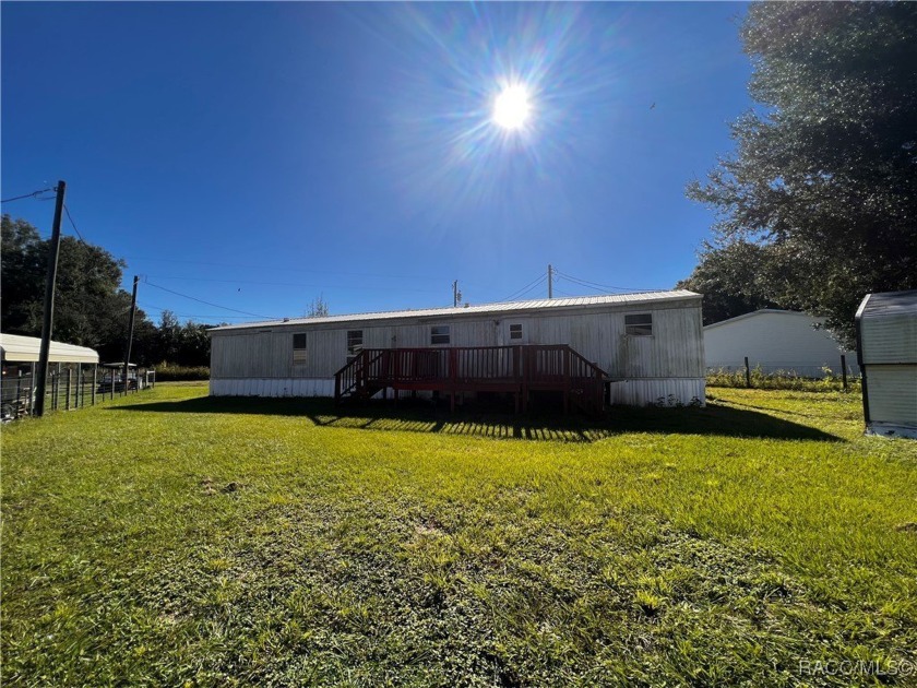 Welcome to your dream escape--a charming 3-bedroom, 2-bath - Beach Home for sale in Inglis, Florida on Beachhouse.com