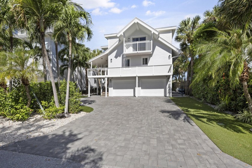 This stunning waterfront home, overlooks the serene waters of - Beach Home for sale in Jupiter, Florida on Beachhouse.com