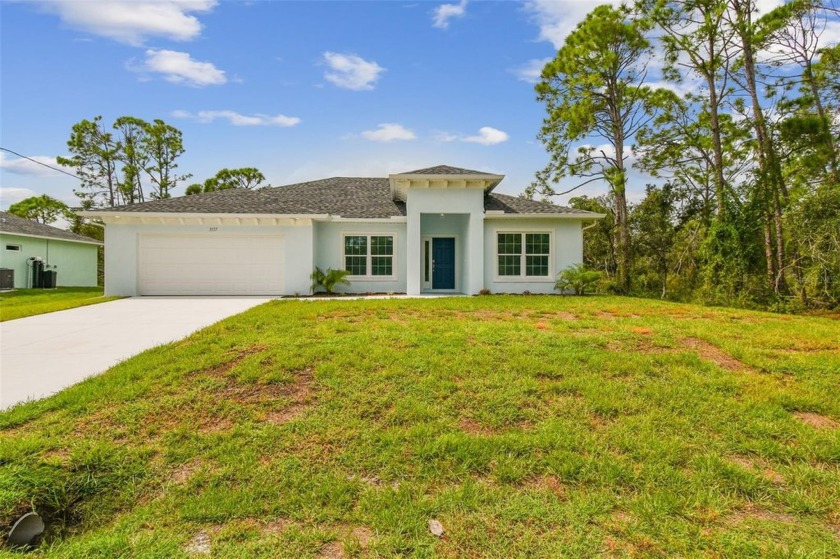 This newly constructed home is move in ready and waiting for - Beach Home for sale in Port Charlotte, Florida on Beachhouse.com