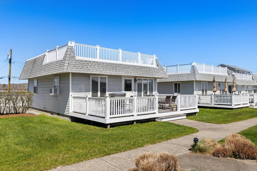 Experience the epitome of waterfront living in this legal - Beach Condo for sale in East Quogue, New York on Beachhouse.com