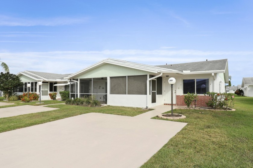 Discover this charming townhome in a vibrant 55+ gated community - Beach Townhome/Townhouse for sale in West Palm Beach, Florida on Beachhouse.com