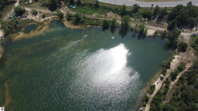 In a word, WOW! This private 11-acre up north paradise is tucked - Beach Acreage for sale in East Tawas, Michigan on Beachhouse.com