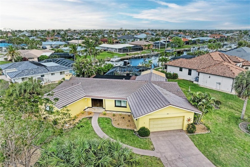 DO NOT MISS OUT ON THIS STUNNING WATERFRONT HOME WITH DOCK/LIFT - Beach Home for sale in Punta Gorda, Florida on Beachhouse.com