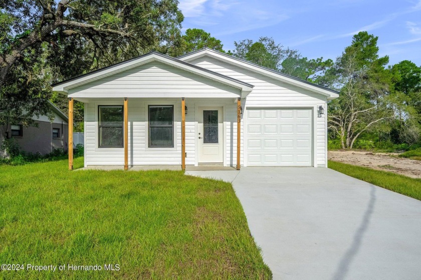 BUILDER OFFERING $5,000 TOWARDS CLOSING COSTS. BRAND NEW - Beach Home for sale in Spring Hill, Florida on Beachhouse.com