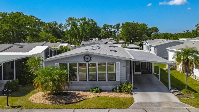 (Espanol a continuacion)  Welcome to The Village at Riverwalk, a - Beach Home for sale in North Port, Florida on Beachhouse.com