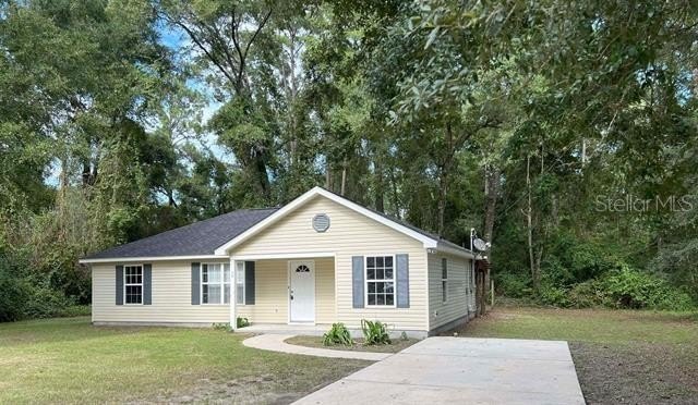 Move-in ready! Super cute 3 bedroom, 2 bathroom home that backs - Beach Home for sale in Crawfordville, Florida on Beachhouse.com