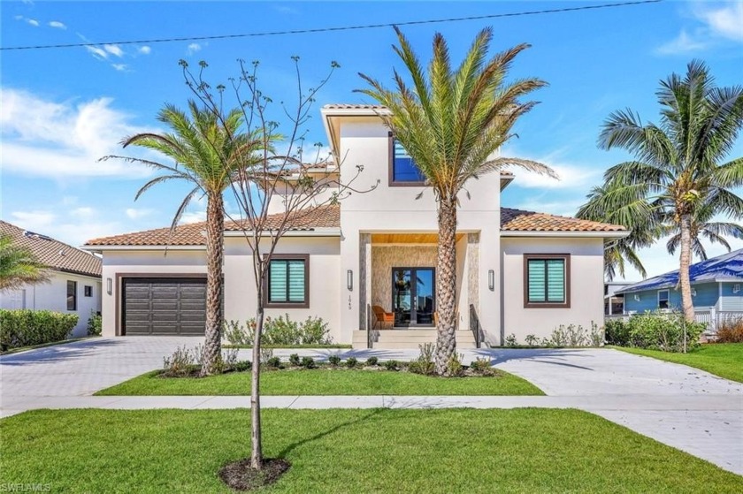 Experience the pinnacle of luxury island living in this - Beach Home for sale in Marco Island, Florida on Beachhouse.com