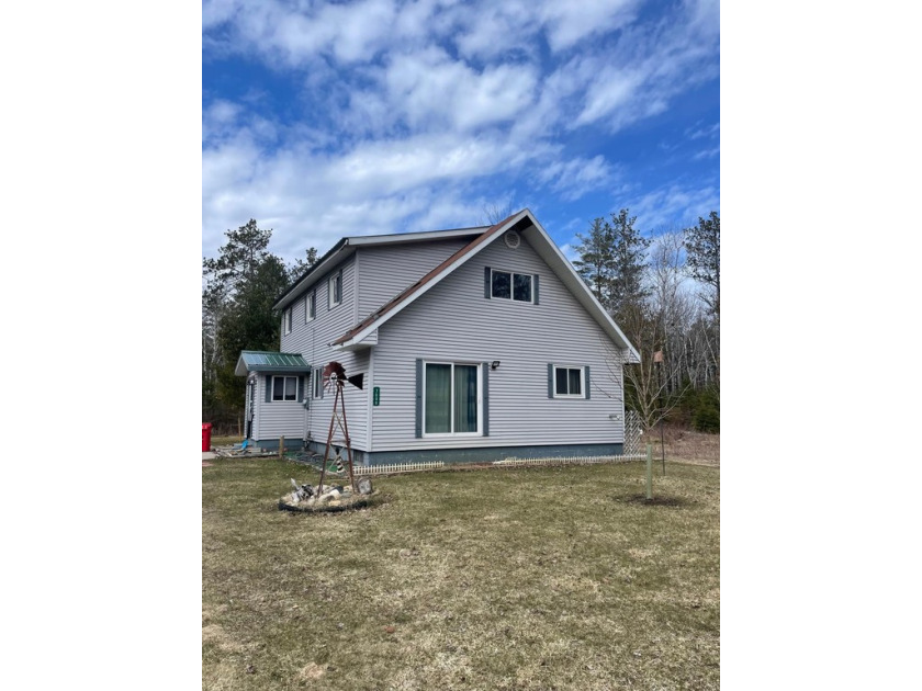 Check out this 3 bedroom 2 bathroom home walking distance to - Beach Home for sale in Presque Isle, Michigan on Beachhouse.com
