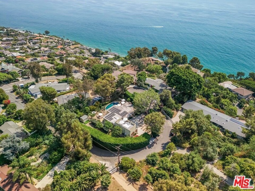 Nestled above the stunning Pacific Ocean within central idyllic - Beach Home for sale in Malibu, California on Beachhouse.com