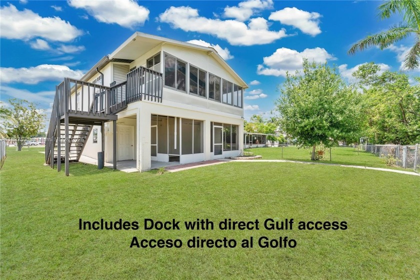 **SHORT SALE!** Light-filled corner home on the Caloosahatchee - Beach Home for sale in Fort Myers, Florida on Beachhouse.com