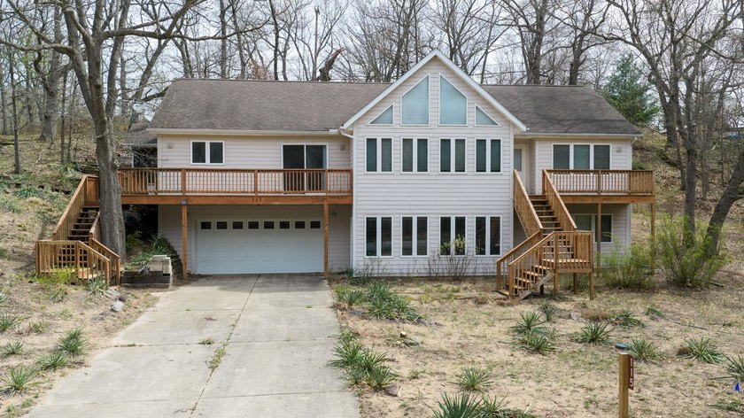 Welcome to this spacious, open, and truly unique home located - Beach Home for sale in Beverly Shores, Indiana on Beachhouse.com