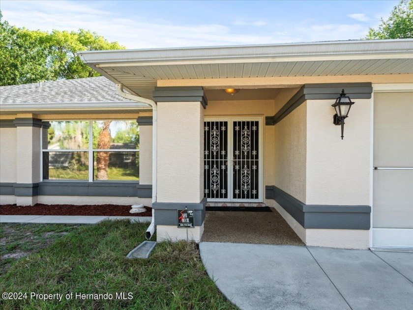 Check out this well LOVED Fully Remodeled POOL Home! NO HOA! - Beach Home for sale in Spring Hill, Florida on Beachhouse.com