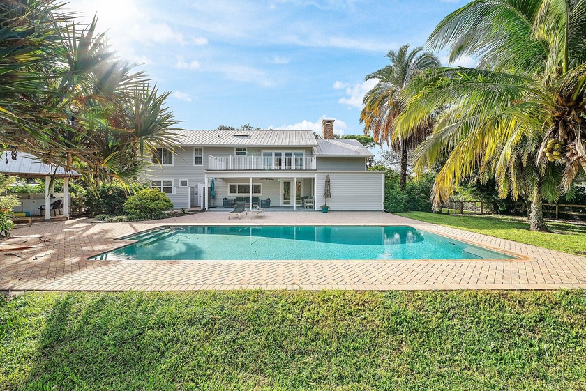 Set on over an acre in the prestigious community of Steeplechase - Beach Home for sale in Palm Beach Gardens, Florida on Beachhouse.com