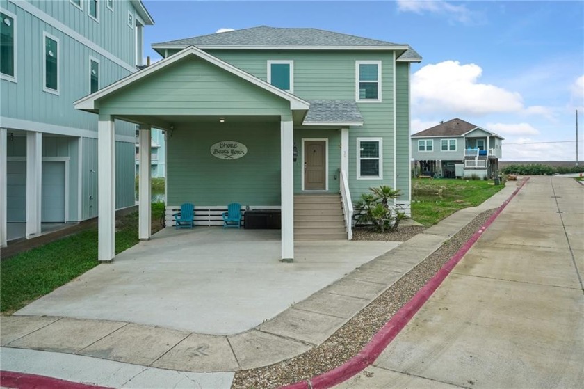 Welcome to this charming coastal retreat! This two-story - Beach Home for sale in Port Aransas, Texas on Beachhouse.com