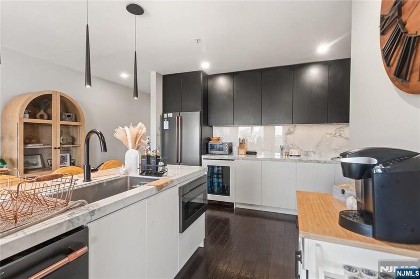 Discover this oversized 2-bedroom, 2-bath residence boasting - Beach Home for sale in Edgewater, New Jersey on Beachhouse.com