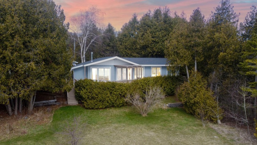 Charming Lake Michigan shorefront home with an impressively - Beach Home for sale in Saint Ignace, Michigan on Beachhouse.com