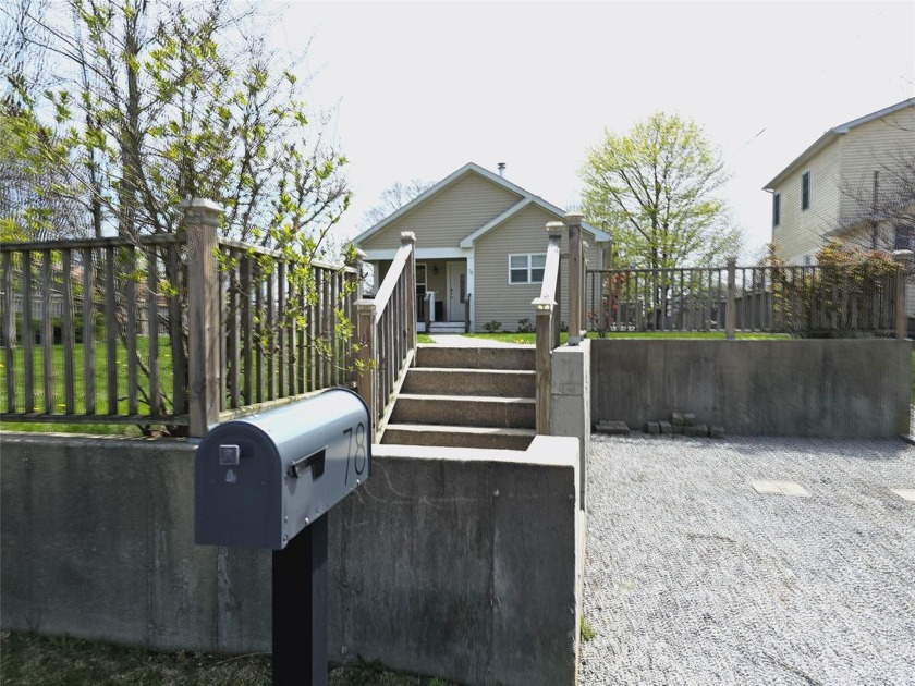 This well-maintained home features three spacious bedrooms and 1 - Beach Home for sale in Shirley, New York on Beachhouse.com
