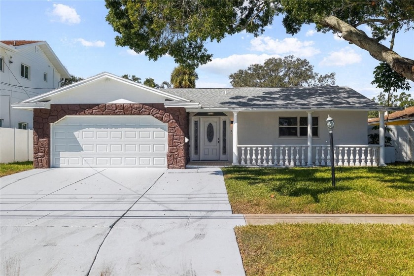 Welcome to your sunny St. Pete retreat! This fully renovated - Beach Home for sale in St. Petersburg, Florida on Beachhouse.com