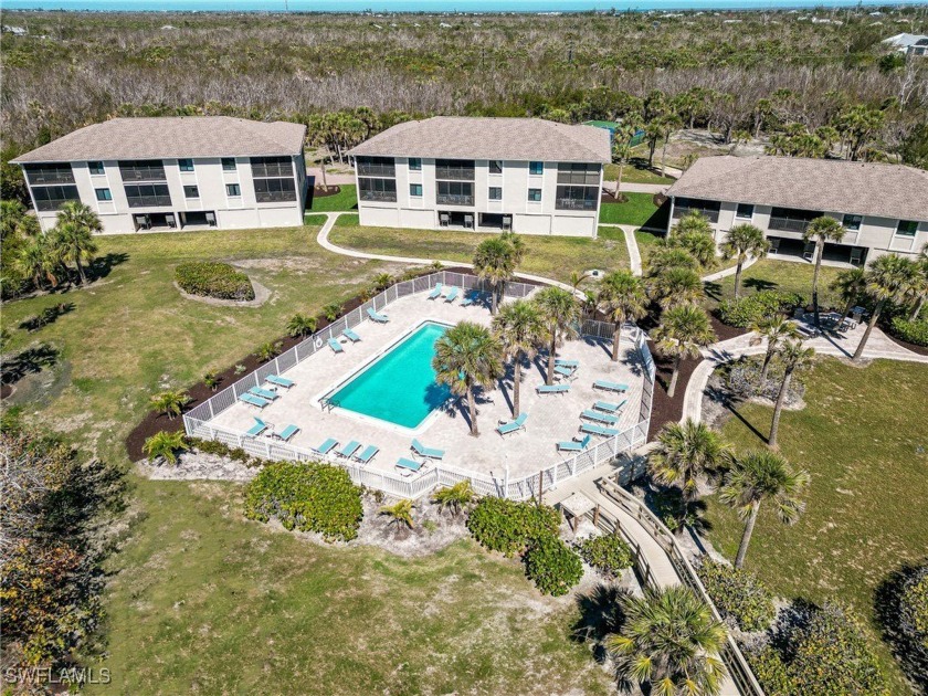 Experience the best of beachfront living in this beautifully - Beach Condo for sale in Sanibel, Florida on Beachhouse.com