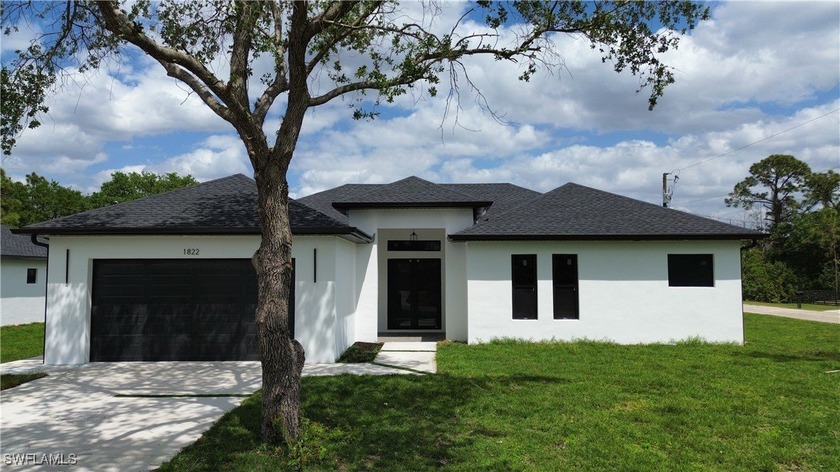 NEW CONSTRUCTION!! Fully impact doors and windows, gorgeous home - Beach Home for sale in Lehigh Acres, Florida on Beachhouse.com