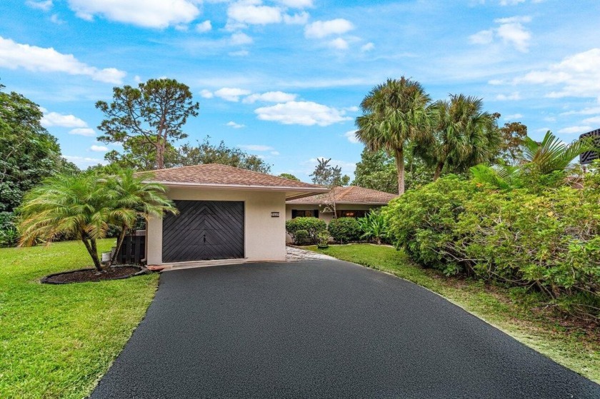 Discover this gorgeous beachy-chic home nestled on a peaceful - Beach Home for sale in Boynton Beach, Florida on Beachhouse.com