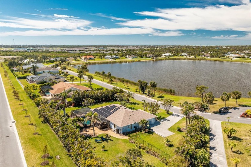 Welcome to your new lake front home with charming gardens in the - Beach Home for sale in Englewood, Florida on Beachhouse.com