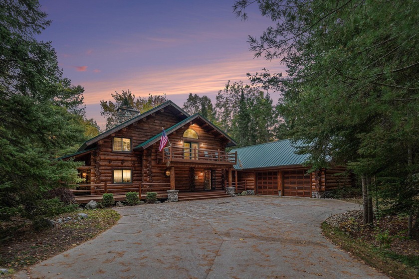 A true Northern Michigan masterpiece, this 4,200 sq. ft. custom - Beach Home for sale in Carp Lake, Michigan on Beachhouse.com