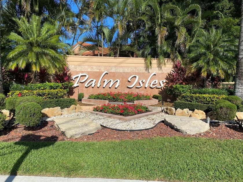 Experience the ultimate resort-style living in Palm Isles! This - Beach Condo for sale in Boynton Beach, Florida on Beachhouse.com