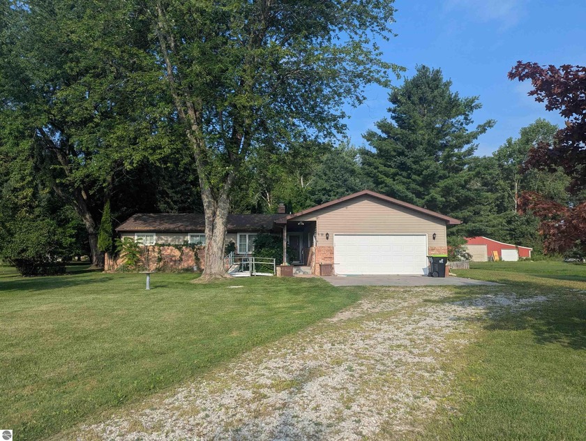 A welcoming 3 bedroom, 1 bath house on an acre just outside the - Beach Home for sale in Au Gres, Michigan on Beachhouse.com