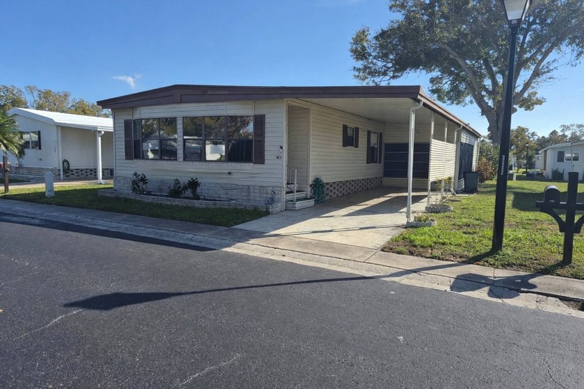 Handicap-accessible 1980 Twin mobile home located in the - Beach Home for sale in Largo, Florida on Beachhouse.com
