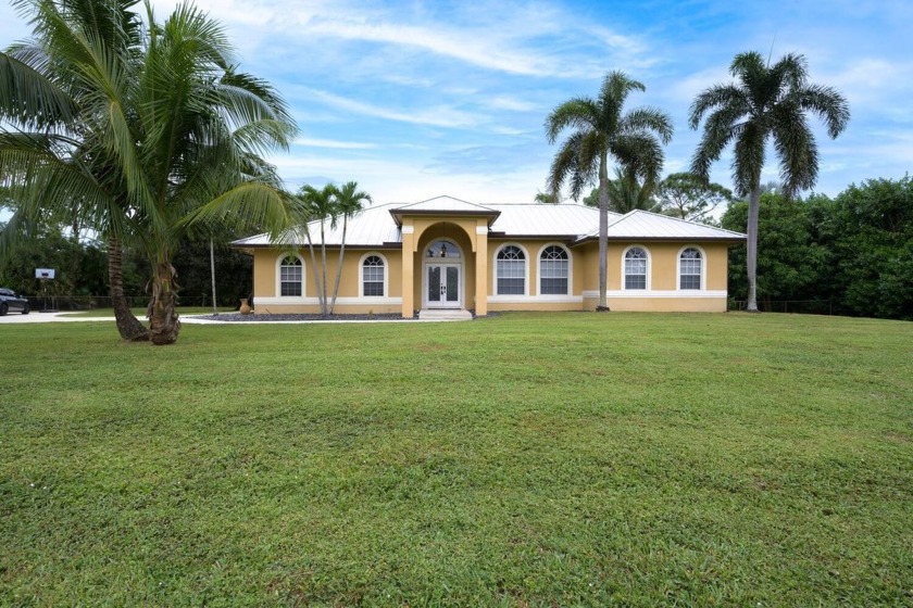 WELCOME HOME to this beautifully upgraded 4 bedroom 2 bathroom - Beach Home for sale in West Palm Beach, Florida on Beachhouse.com