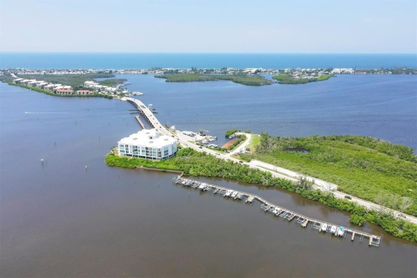 LUXURY WATERFRONT CONDOMINIUM WITH BOAT SLIP AND 10,000lb LIFT - Beach Condo for sale in Englewood, Florida on Beachhouse.com
