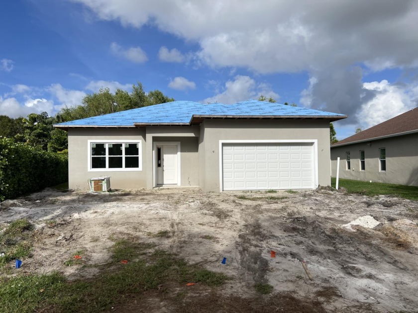 Welcome to your dream home! This under-construction, set to be - Beach Home for sale in Port Saint Lucie, Florida on Beachhouse.com