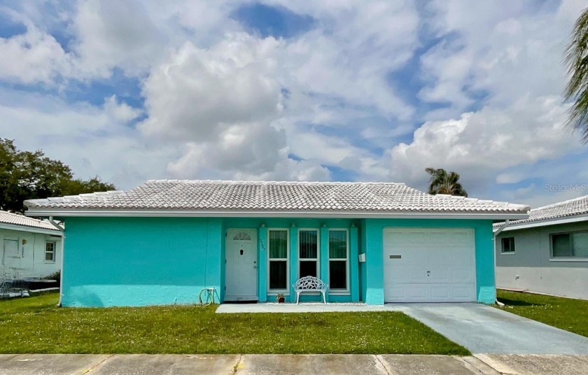 Introducing a charming 2-bedroom, 2-bathroom home with a 1-car - Beach Home for sale in Pinellas Park, Florida on Beachhouse.com