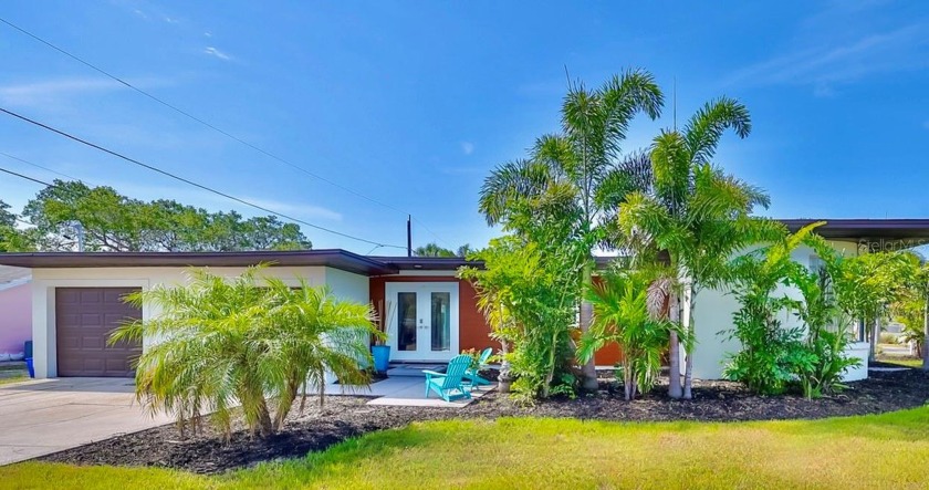 Welcome to this MID-CENTURY MODERN home in the heart of - Beach Home for sale in Gulfport, Florida on Beachhouse.com