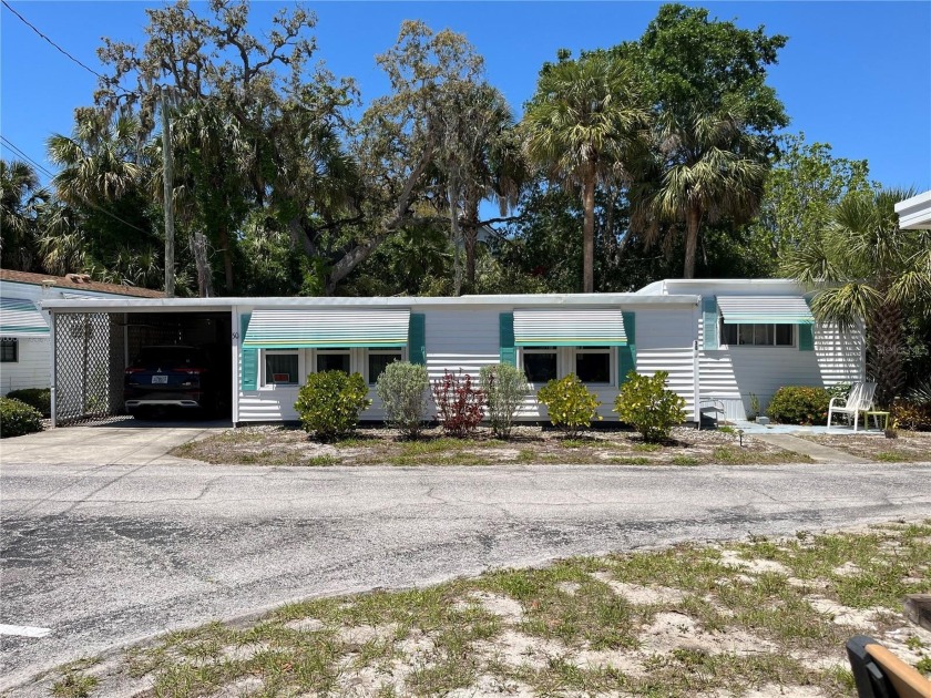 PEACEFUL, PRIVATE & PRIME LOCATION!  Gulf front community with - Beach Home for sale in Palm Harbor, Florida on Beachhouse.com