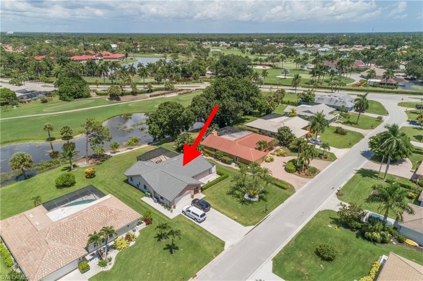 Tropical, lushly landscaped .27 acre lot with tranquil lagoon - Beach Home for sale in Naples, Florida on Beachhouse.com