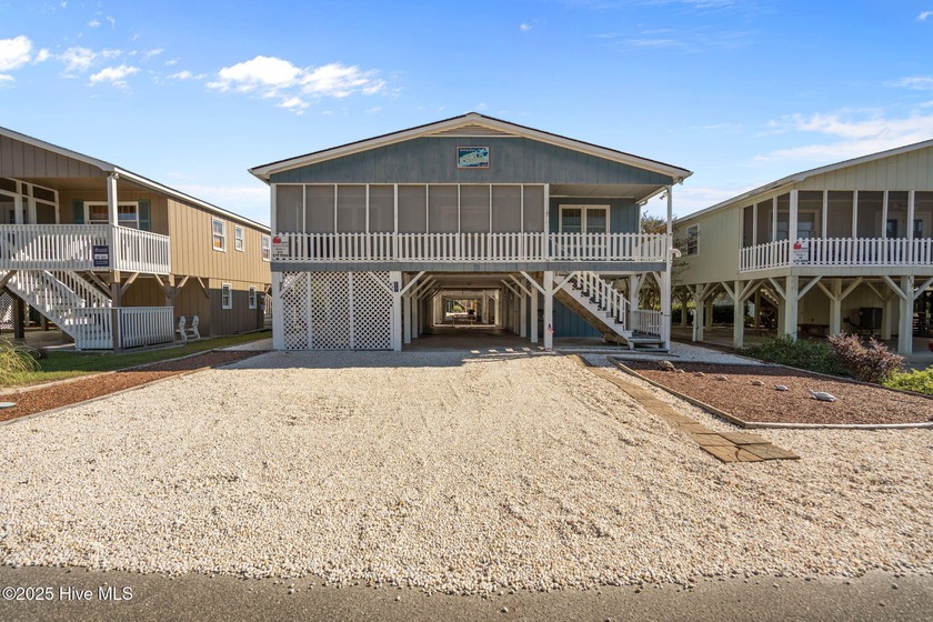 Discover coastal charm in this inviting 5-bedroom, 3-bath home - Beach Home for sale in Sunset Beach, North Carolina on Beachhouse.com