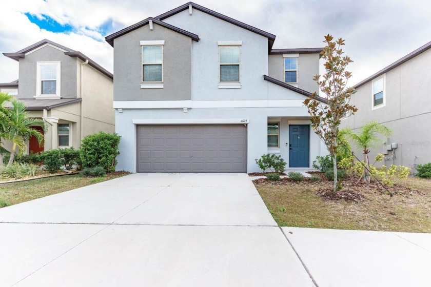 Welcome to this beautiful two-story POND VIEW home built in 2021 - Beach Home for sale in Wimauma, Florida on Beachhouse.com