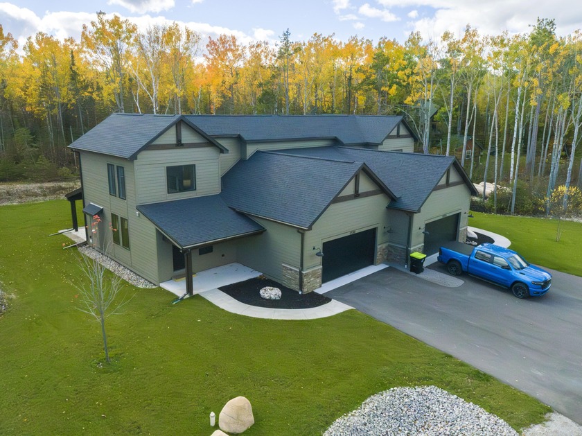 Upscale condominium duplex unit with 3 Beds, 2.5 Baths, attached - Beach Condo for sale in Presque Isle, Michigan on Beachhouse.com